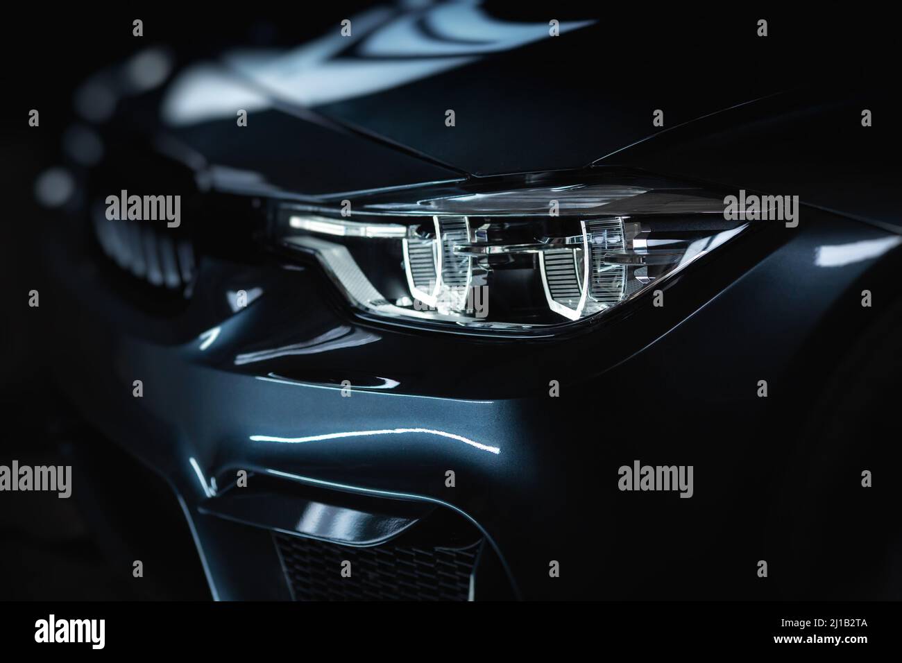 Modern car with bright LED headlights Stock Photo - Alamy