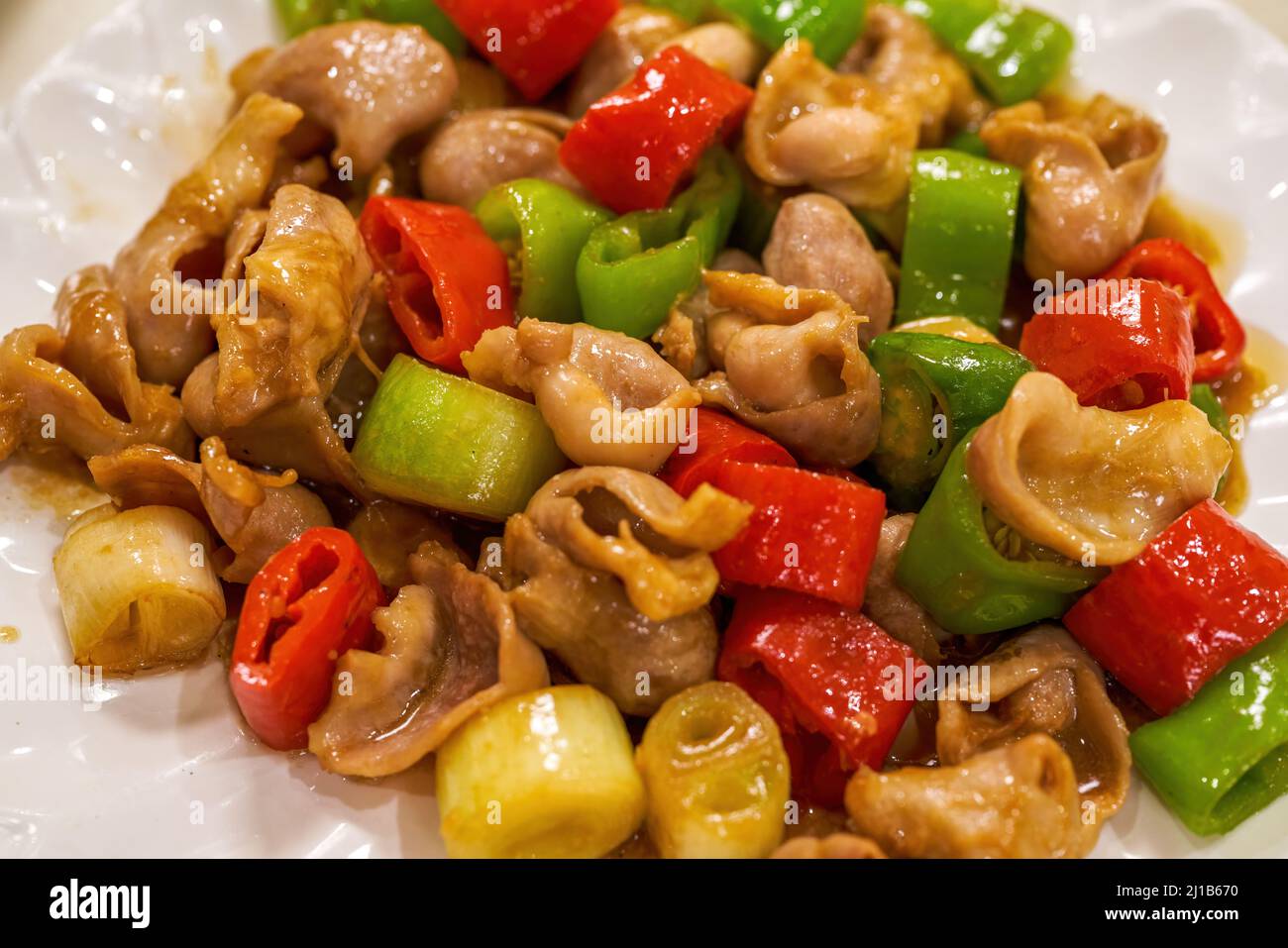 A sweet and delicious Chinese dish, fried pork intestines Stock Photo