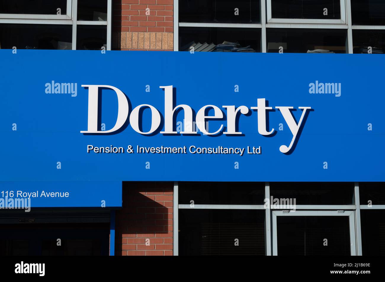 Belfast, UK- Feb 21, 2022:The sign for Doherty Pension and Investment Consultancy in Belfast Northern Ireland. Stock Photo