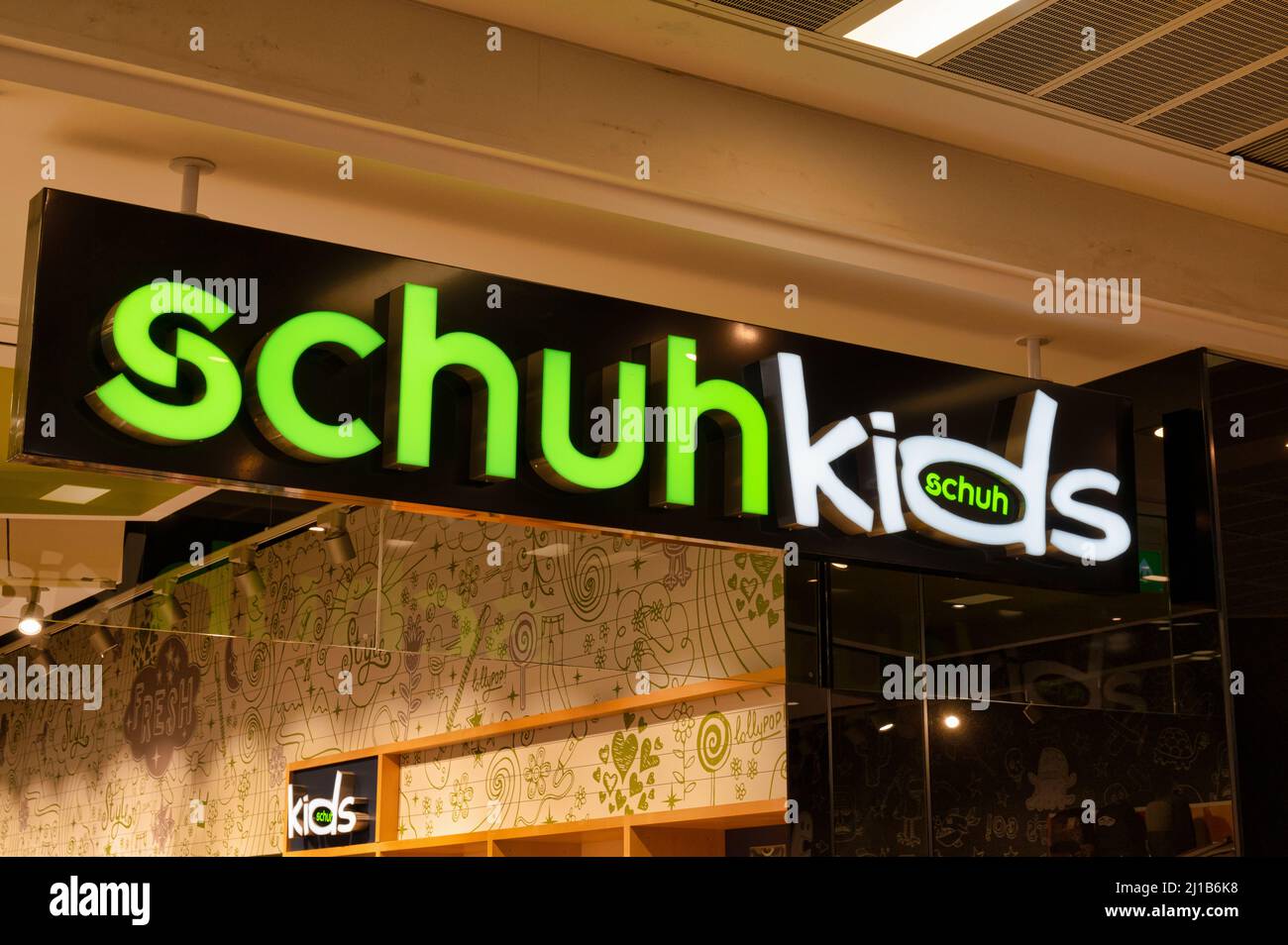 Belfast, UK- Feb 21, 2022:The sign for Schuh Kids in Belfast Northern Ireland. Stock Photo