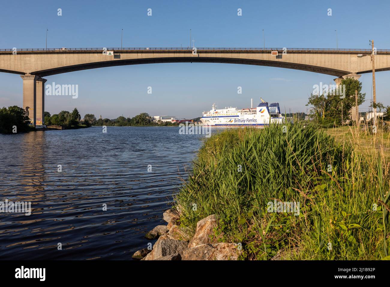 BRITTANY FERRIES BOAT AND CALIX VIADUCT ABOVE THE CANAL RUNNING FROM CAEN TO THE SEA, CAEN, CALVADOS, NORMANDY, FRANCE Stock Photo
