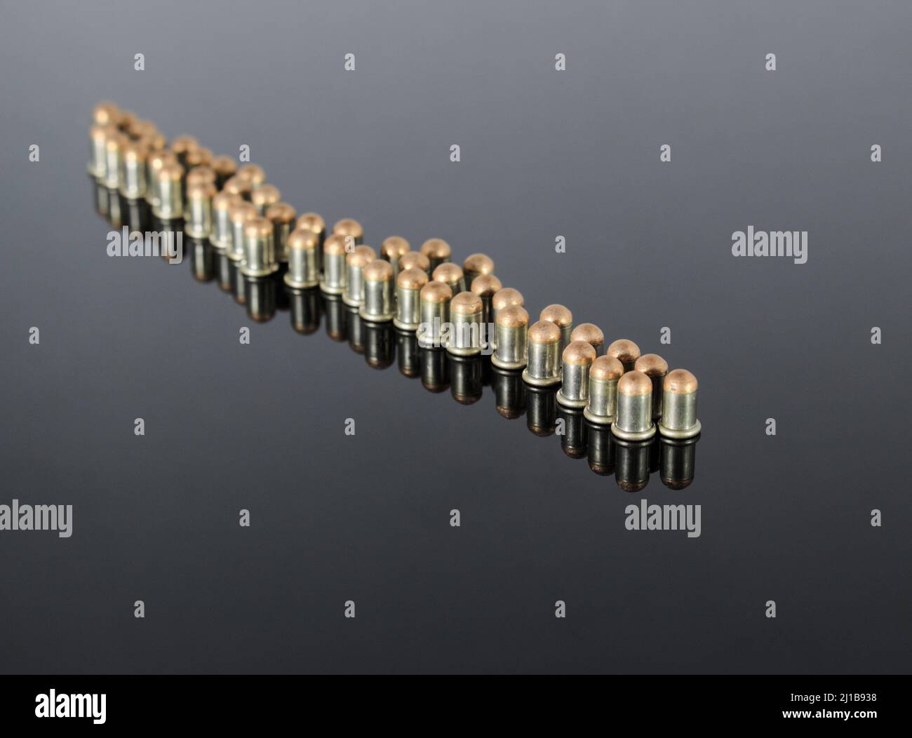 Ammunition .22 BB Cup  Bullet on a mirrored background Stock Photo