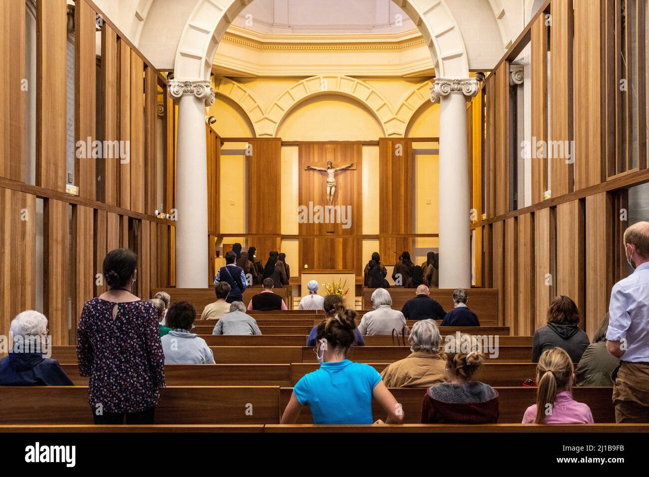 EVENING MASS AT THE CARMEL CHAPEL, SAINTE THERESE SHRINE AND MEMORIAL, LISIEUX, CALVADOS, NORMANDY, FRANCE Stock Photo