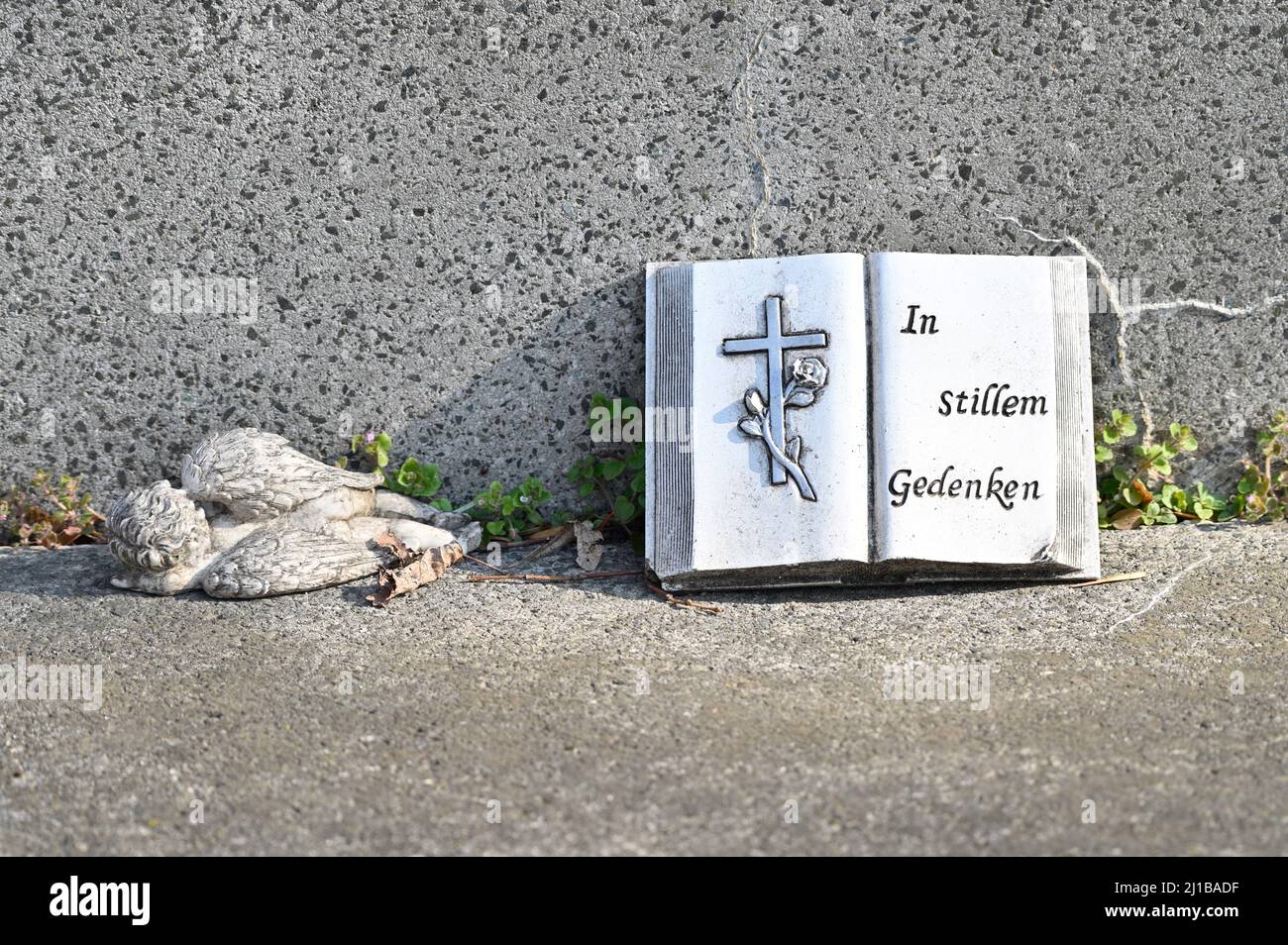 Vienna, Austria. The central cemetery in Vienna. Stone Bible on a grave. Remember in silent Stock Photo