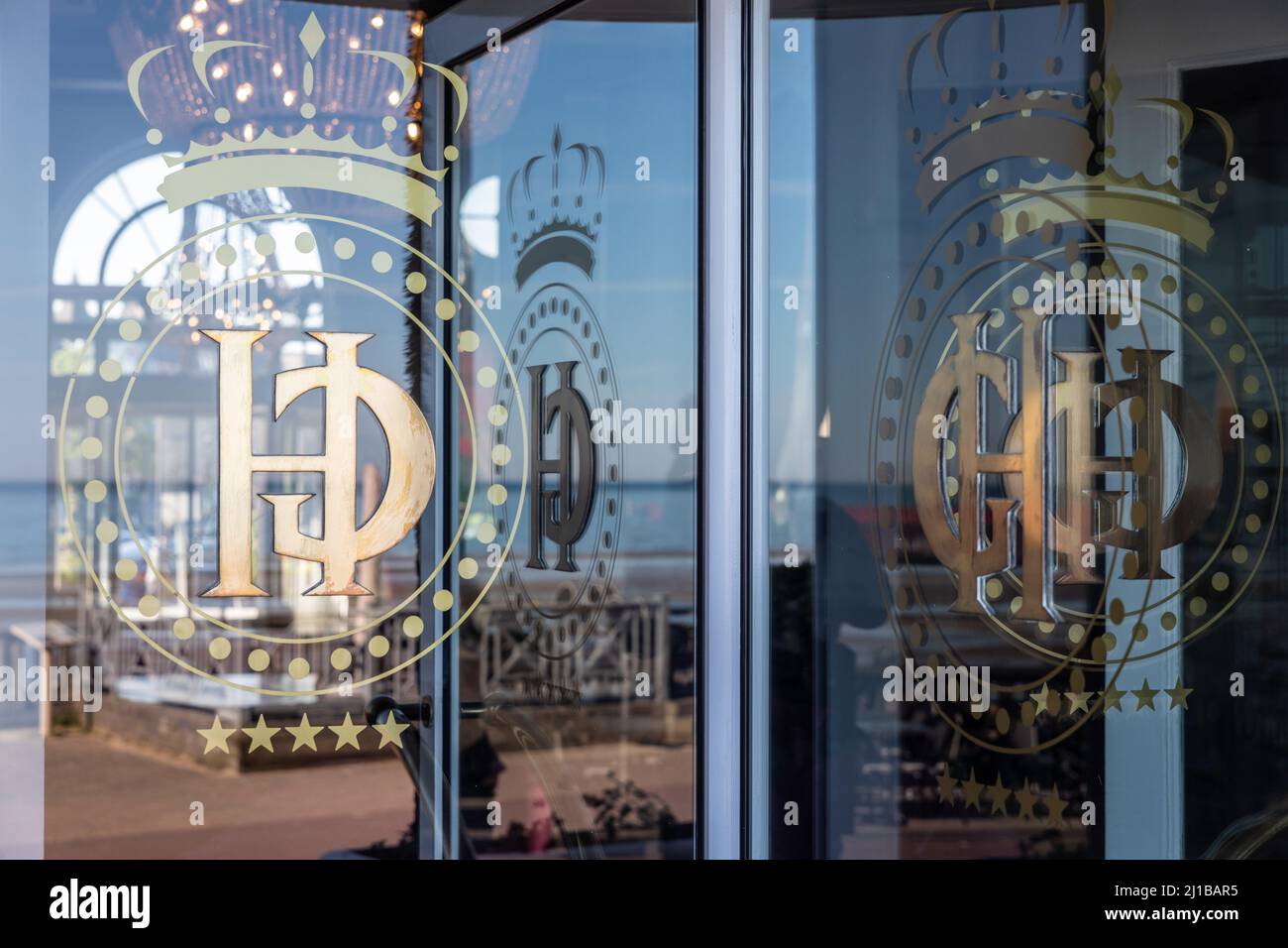SEASIDE ENTRANCE TO THE GRAND HOTEL, CABOURG, Stock Photo