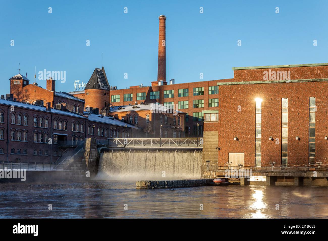 THE WALK OF LOVE LOCKS, TAMMERKOSKI FALLS WITH ITS HYDROELECTRIC PLANT AND THE FRENCKELL THEATER, TAMPERE, FINLAND, EUROPE Stock Photo