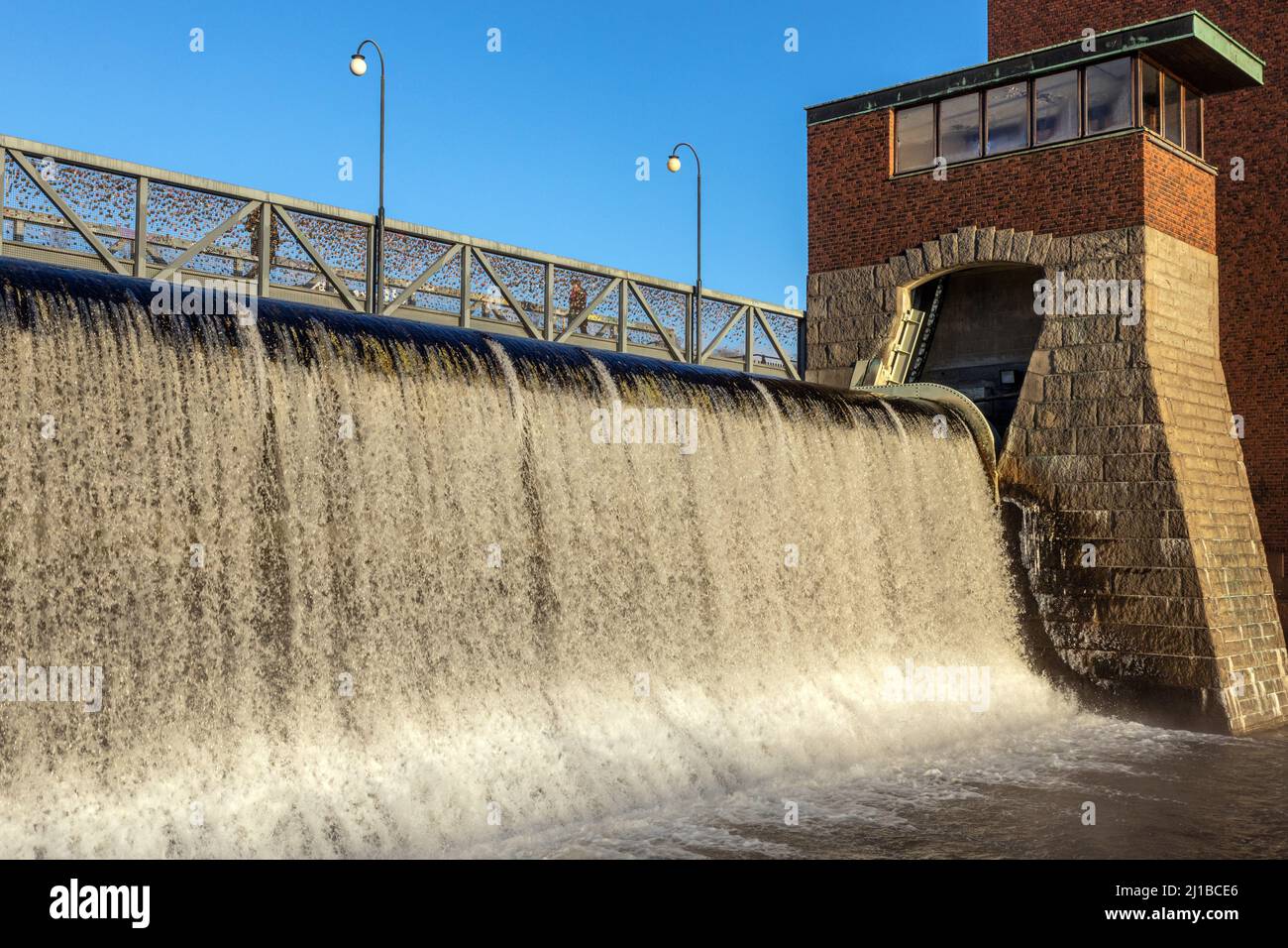 THE WALK OF LOVE LOCKS, TAMMERKOSKI FALLS NEXT TO THE HYDROELECTRIC PLANT, TAMPERE, FINLAND, EUROPE Stock Photo