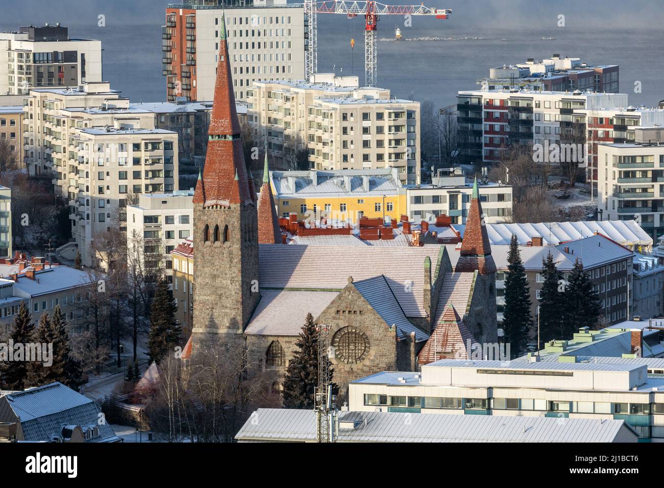 TAMPERE CATHEDRAL IN GRANITE WITH ITS THREE BELL TOWERS OF RED TILES IN WINTER AS SEEN FROM THE PANORAMIC MORO SKY BAR, TAMPERE, FINLAND, EUROPE Stock Photo