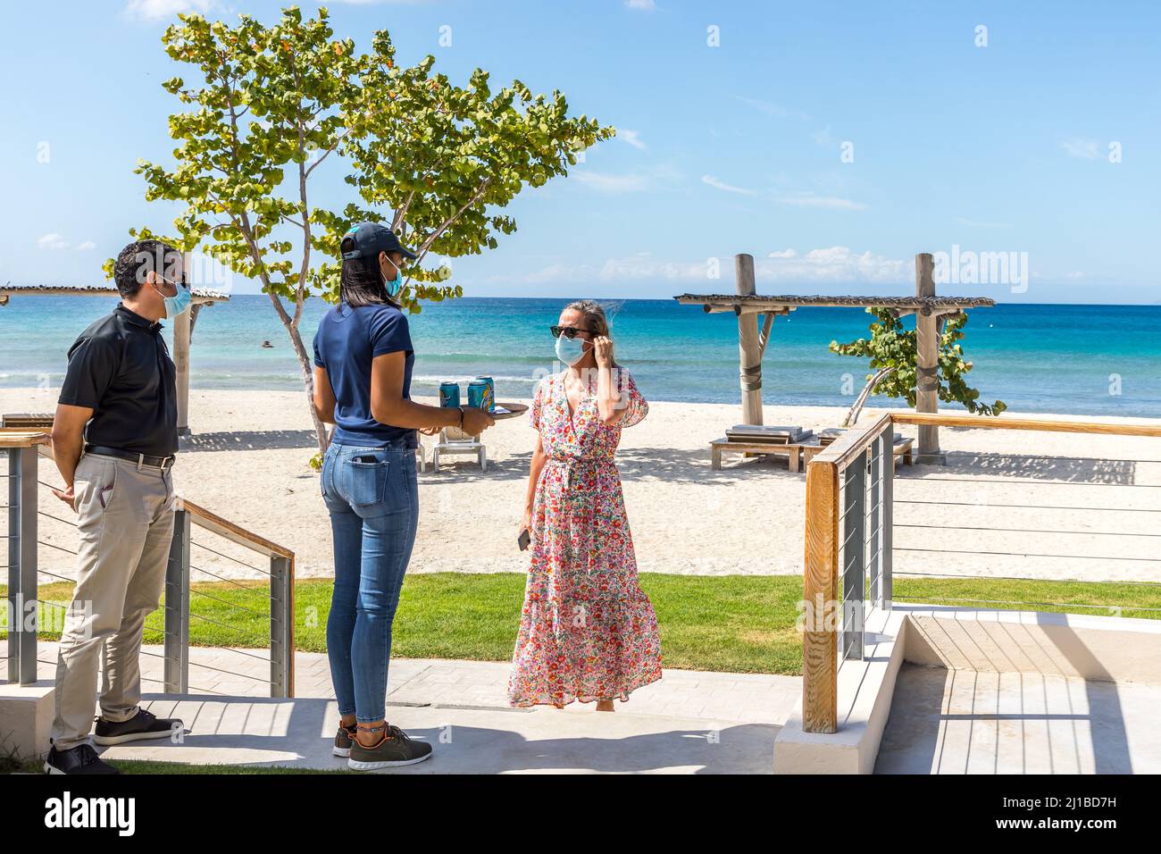 ILLUSTRATION OF THE DECLINE IN THE NUMBER OF RESORT BOOKINGS, PROTECTIVE MEASURES AND SOCIAL DISTANCING DURING THE COVID 19 PANDEMIC, BEACH OF THE WESTIN PUNTA CANA RESORT & CLUB, DOMINICAN REPUBLIC Stock Photo