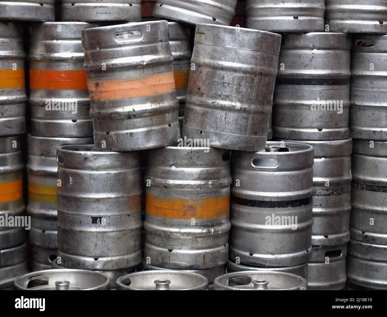 Range of stacked beer casks of kegs Stock Photo Alamy