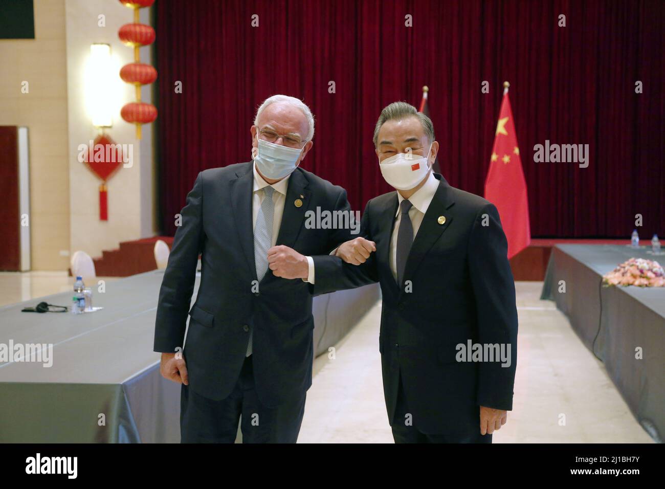 Islamabad, Pakistan. 23rd Mar, 2022. Chinese State Councilor and Foreign Minister Wang Yi (R) meets with Palestinian Foreign Minister Riyad al-Maliki in Islamabad, Pakistan, March 23, 2022. Credit: Ahmad Kamal/Xinhua/Alamy Live News Stock Photo