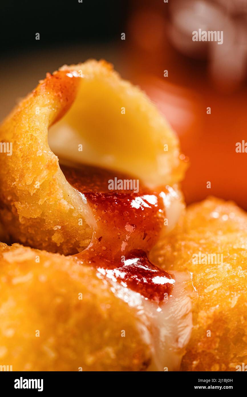 Fried brie cheese with cranberry sauce. Close up Stock Photo Alamy