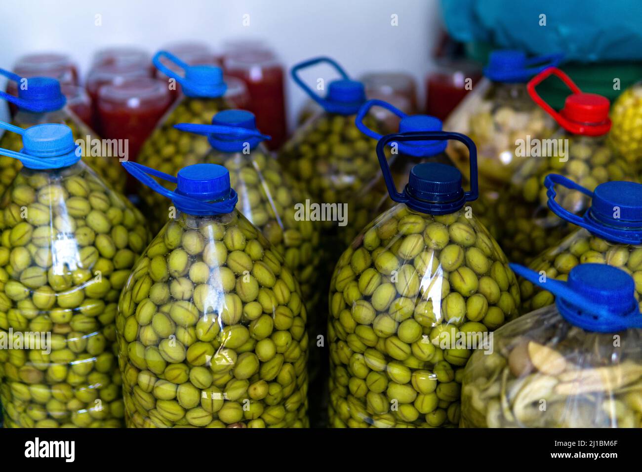 home canning, green olives pickled in plastic bottles Stock Photo Alamy