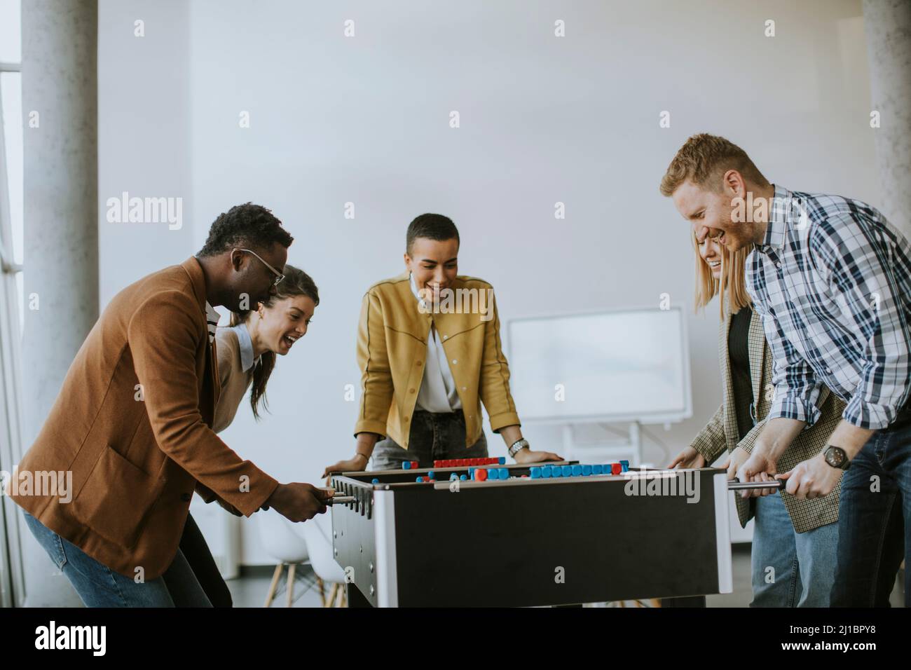 Fantasy Football Draft still life. A pad and pencil and an American style  football on a white wood table in a home office Stock Photo - Alamy