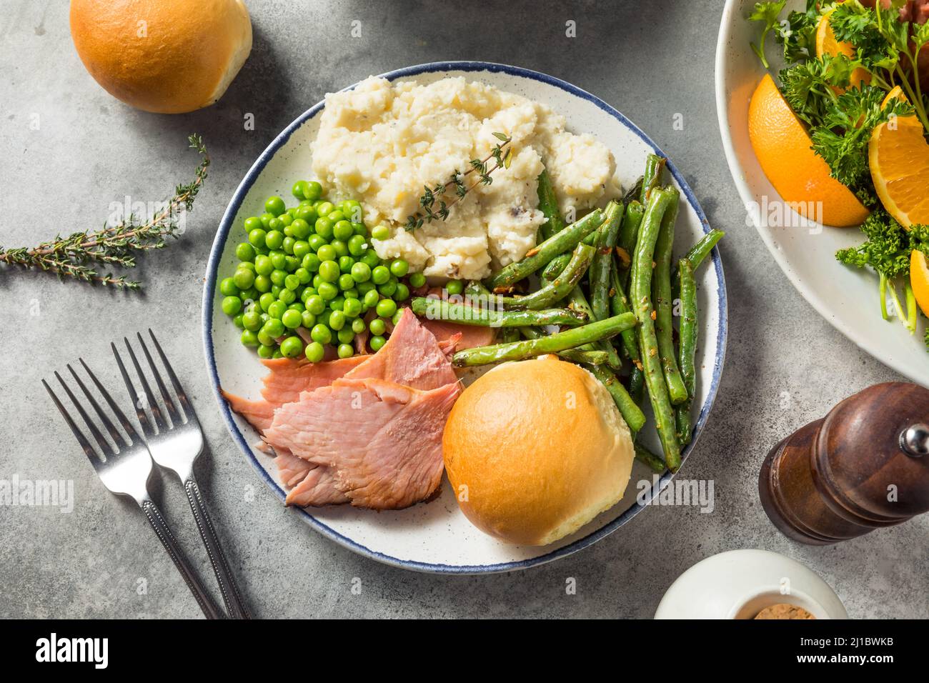 Homemade Easter Ham Dinner with Pototoes Beans and Peas Stock Photo Alamy