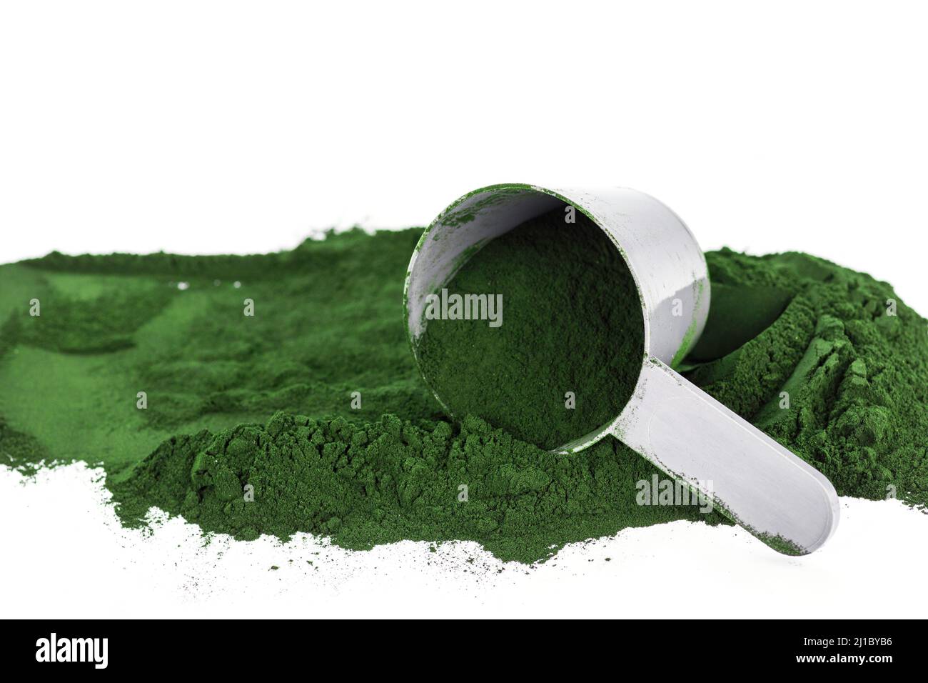 Green vegetarian protein or spirulina powder on white Stock Photo Alamy