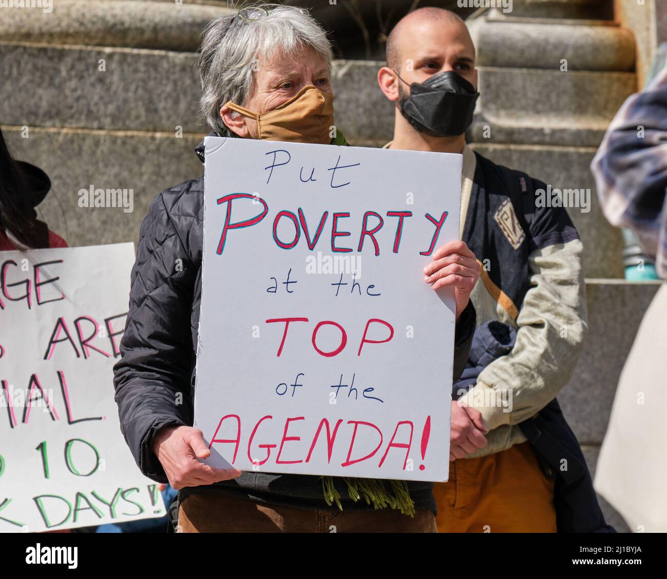Halifax, Nova Scotia, Canada. March 24th, 2022. Protester demanding that Poverty be at Top of Agenda as Provincial Legislature opens today for the Spring Session to demand actions from the Houston Conservative government. As inflation reaches 40 year high, and with rental vacancies below 1% protesters demand actions in housing, increase in minimum wages and sick days legislations. Credit: meanderingemu/Alamy Live News Stock Photo