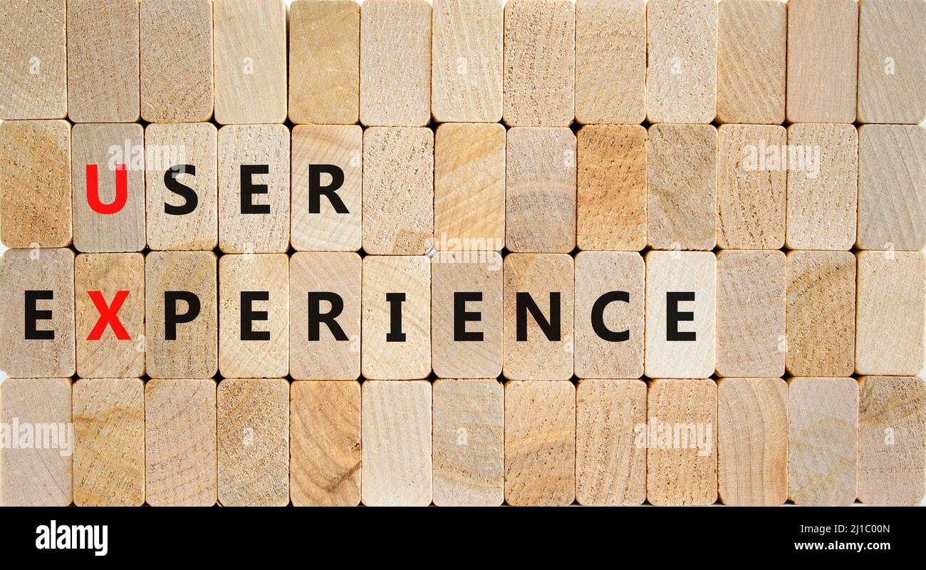 UX user experience symbol. Concept words UX user experience on wooden ...