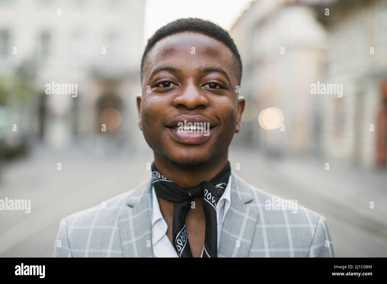 Portrait of handsome african american man in stylish suit and scarf ...