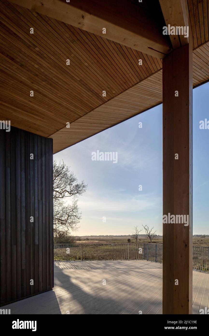 View through canopy to marsh. Carlton Marshes Visitor Centre, Carlton Colville, Lowestoft, United Kingdom. Architect: Cowper Griffith Architects, 2021 Stock Photo