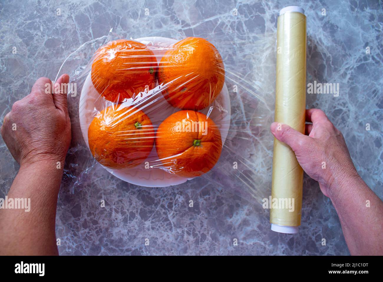 Fruit fresh plastic wrap hi-res stock photography and images - Alamy