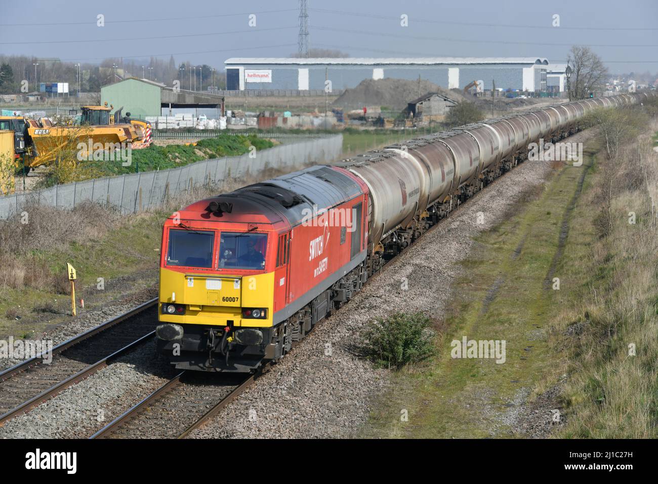DB Cargo Class 60 diesel locomotive number 60007 pictured in low winter sunshine working a Lindsey Oil Refinery to Kingsbury Oil Terminal tanker train Stock Photo