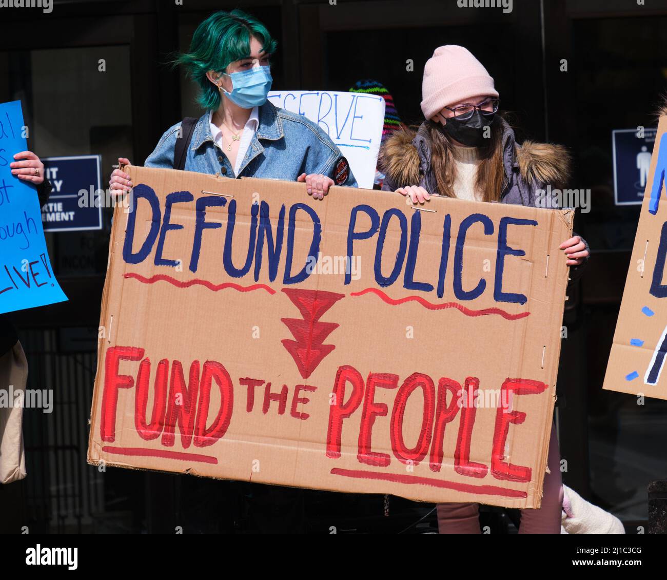 Defund Police, Fund the People sign at Anti Poverty rally in Halifax, canada Stock Photo
