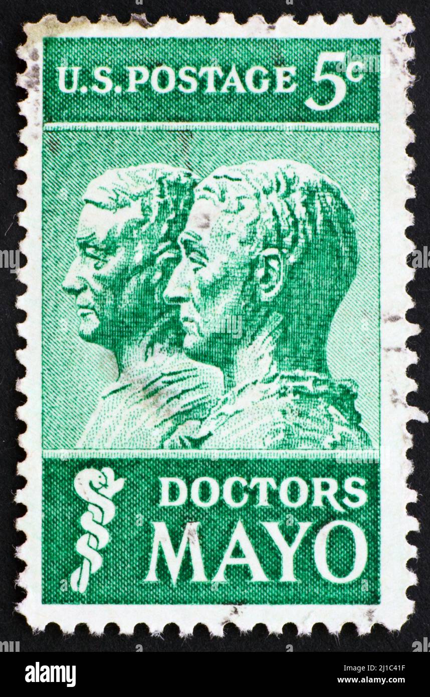 UNITED STATES OF AMERICA - CIRCA 1964: a stamp printed in the United States of America shows Drs. William and Charles Mayo from sculpture by James Ear Stock Photo