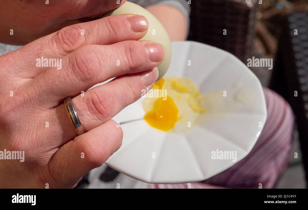Blow out an egg for Easter Stock Photo