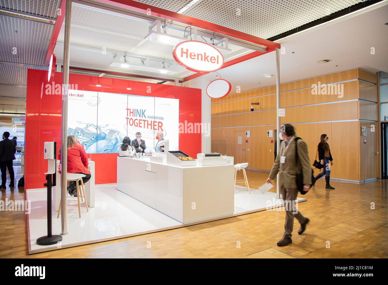 Munich, Germany. 24th Mar, 2022. Stand of Henkel at the Lopec trade fair on March 24, 2022 in Munich, Germany. The LOPEC is a yearly hold trade fair for organic and printed electrinics. (Photo by Alexander Pohl/Sipa USA) Credit: Sipa USA/Alamy Live News Stock Photo