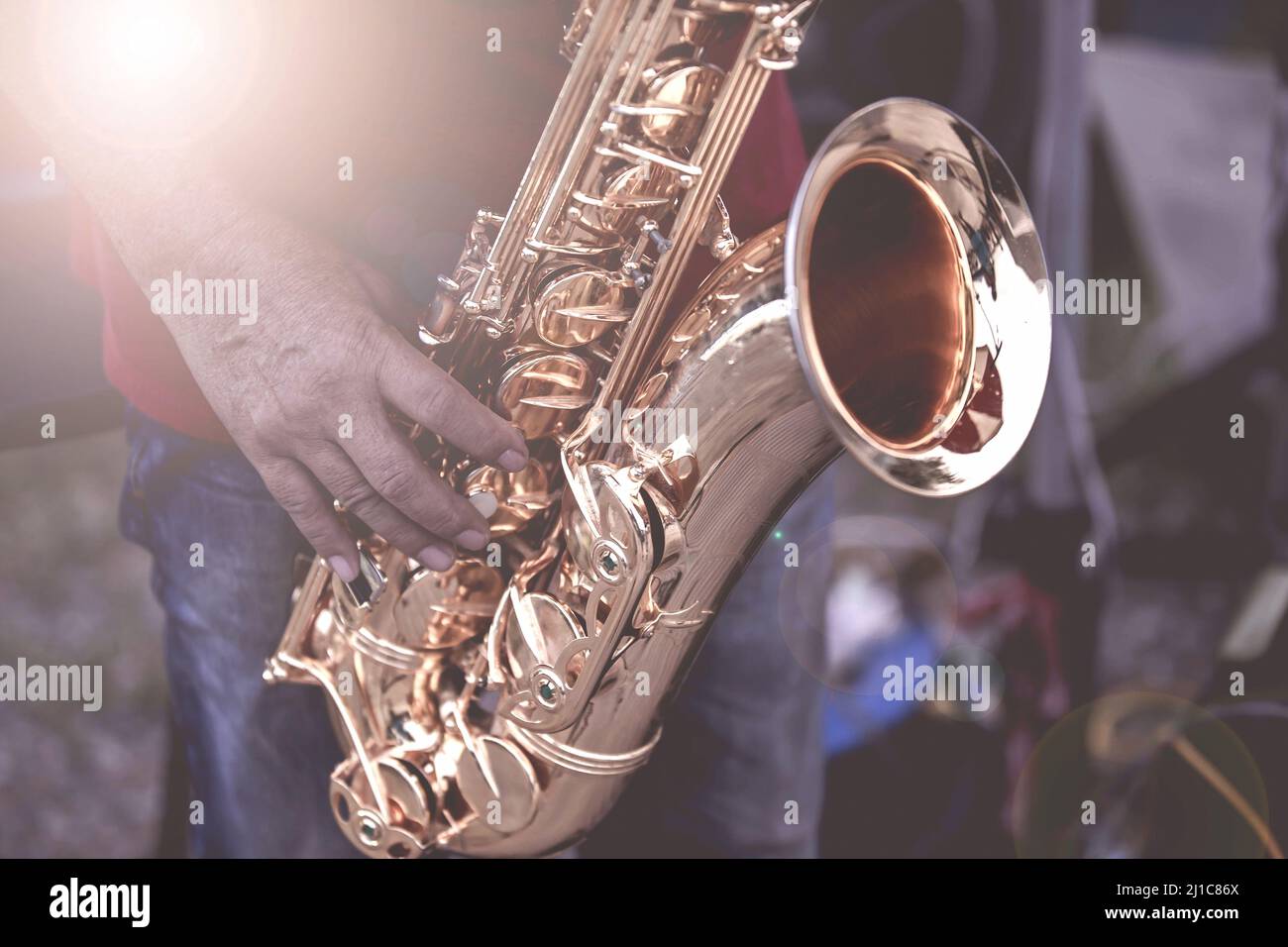 Musical instruments ,Saxophone Player hands Saxophonist playing jazz music. Alto sax musical instrument closeup Stock Photo