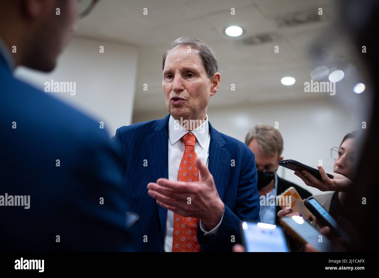 Washington, USA. 24th Mar, 2022. Senator Ron Wyden (D-OR) speaks to media in the Senate Subway at the U.S. Capitol, in Washington, DC, on Thursday, March 24, 2022. Republicans grilled President Joe Biden's nominee to the Supreme Court Judge Kentanji Brown Jackson during two days of questioning this week, accusing her of being soft on crime and demanding additional information from the White House. (Graeme Sloan/Sipa USA) Credit: Sipa USA/Alamy Live News Stock Photo