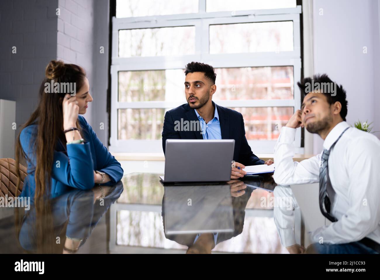 Angry Sad Family With Lawyer. Couple Divorce Dispute Stock Photo