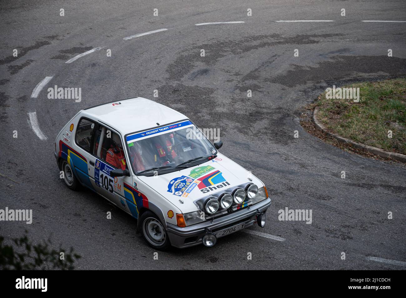 A closeup of a Peugeot 205 Rallye in 9 Lloret de Mar asphalt rally ...