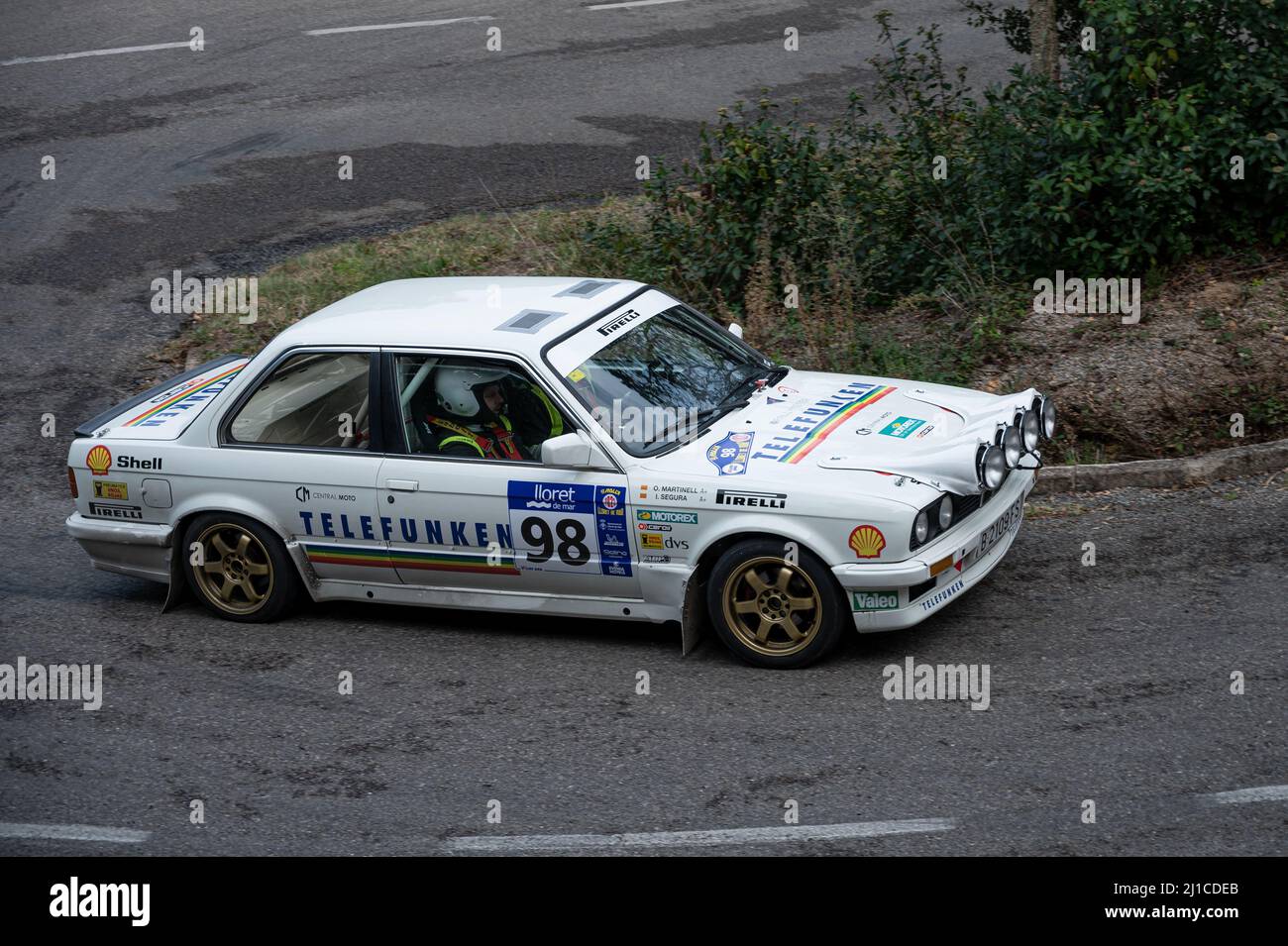 A closeup of a BMW E30 325i in 9 Lloret de Mar asphalt rally Stock Photo