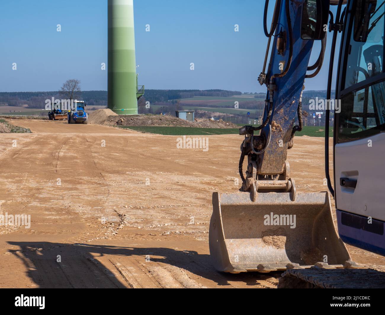 Excavator with shovel on a construction site Stock Photo
