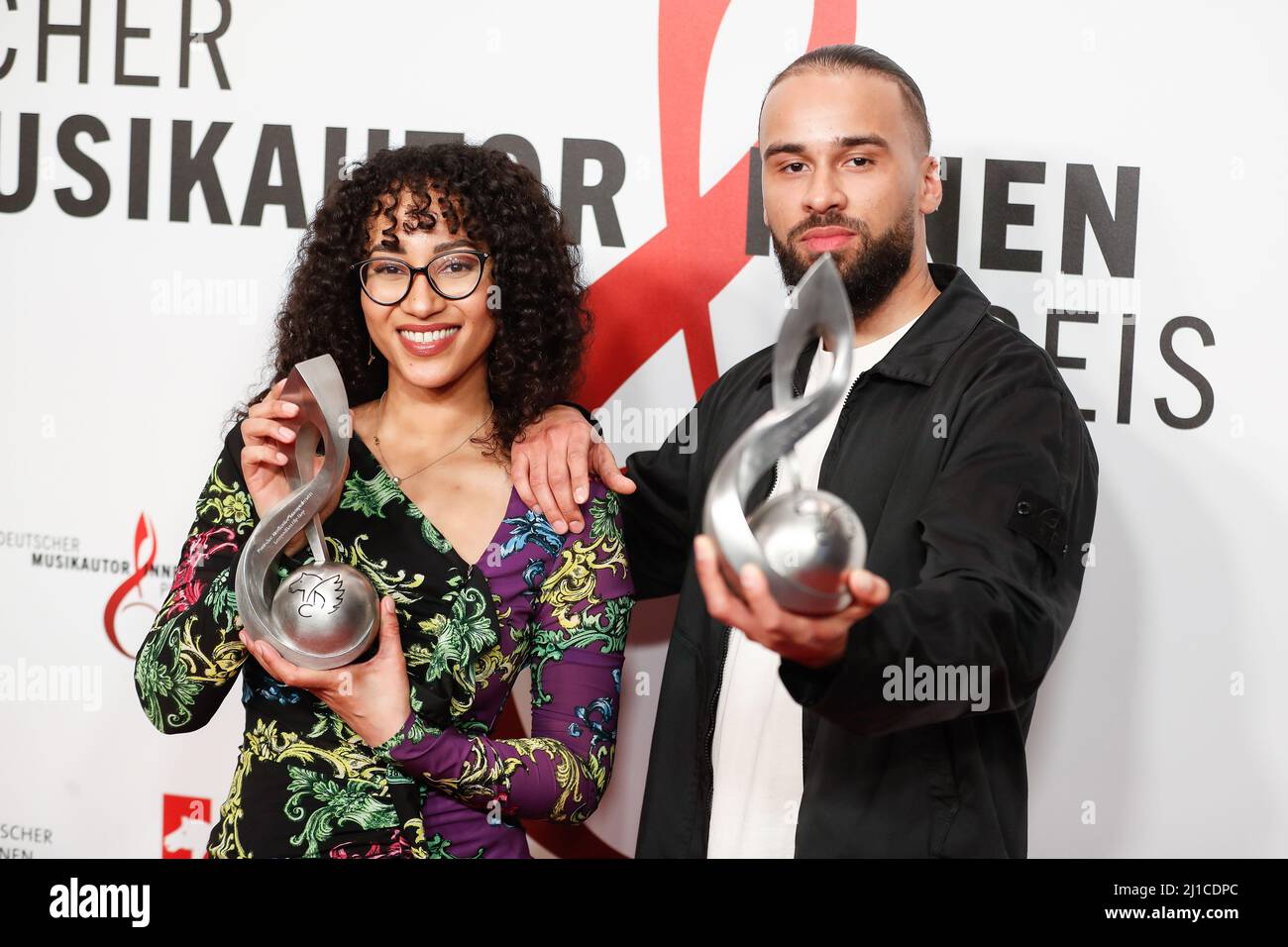 Berlin, Germany. 24th Mar, 2022. The producer team Suena and Lucry wins the award in the category 'Hip-Hop' at the 13th German Music Authors Award ceremony at the Ritz-Carlton Hotel. Credit: Gerald Matzka/dpa/Alamy Live News Stock Photo
