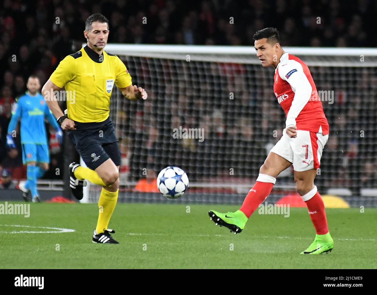 LONDON, ENGLAND - MARCH 7, 2017: Greek FIFA referee Tasos Sidiropoulos (L) and Alexis Sanchez (R) of Arsenal pictured during the second leg of the UEFA Champions League Round of 16 game between Arsenal FC and Bayern Munchen at Emirates Stadium. Copyright: Cosmin Iftode/Picstaff Stock Photo
