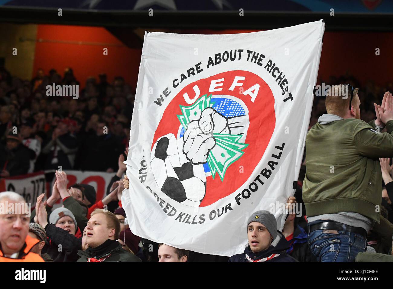 LONDON, ENGLAND - MARCH 7, 2017: Bayern ultras display a protest banner during the second leg of the UEFA Champions League Round of 16 game between Arsenal FC and Bayern Munchen at Emirates Stadium. Copyright: Cosmin Iftode/Picstaff Stock Photo