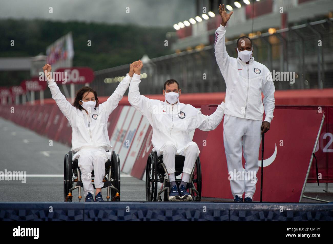 Bronze medalists Alicia Dana, Ryan Pinney and Freddie de los Santos on the podium for the team relay at the 2020 Paralympic Games, Paracycling. Stock Photo