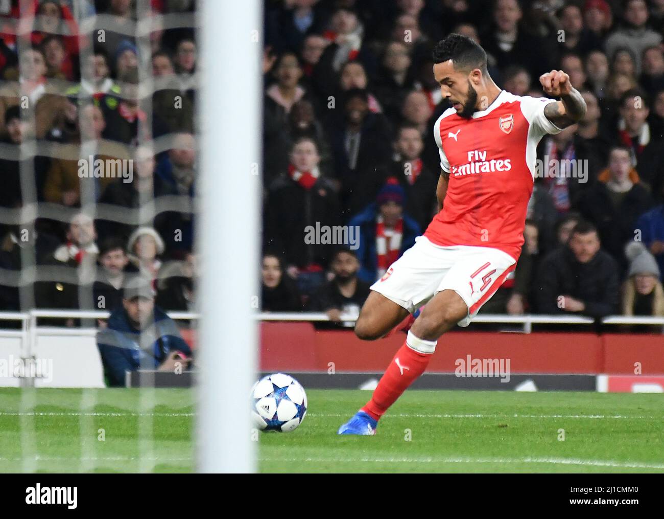 LONDON, ENGLAND - MARCH 7, 2017: Theo Walcott of Arsenal shots and scores during the second leg of the UEFA Champions League Round of 16 game between Arsenal FC and Bayern Munchen at Emirates Stadium. Copyright: Cosmin Iftode/Picstaff Stock Photo