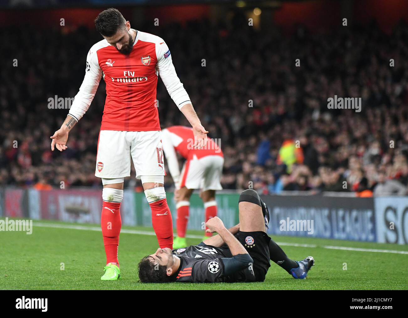 LONDON, ENGLAND - MARCH 7, 2017: Olivier Giroud of Arsenal looks down to Javi Martinez of Bayern during the second leg of the UEFA Champions League Round of 16 game between Arsenal FC and Bayern Munchen at Emirates Stadium. Copyright: Cosmin Iftode/Picstaff Stock Photo