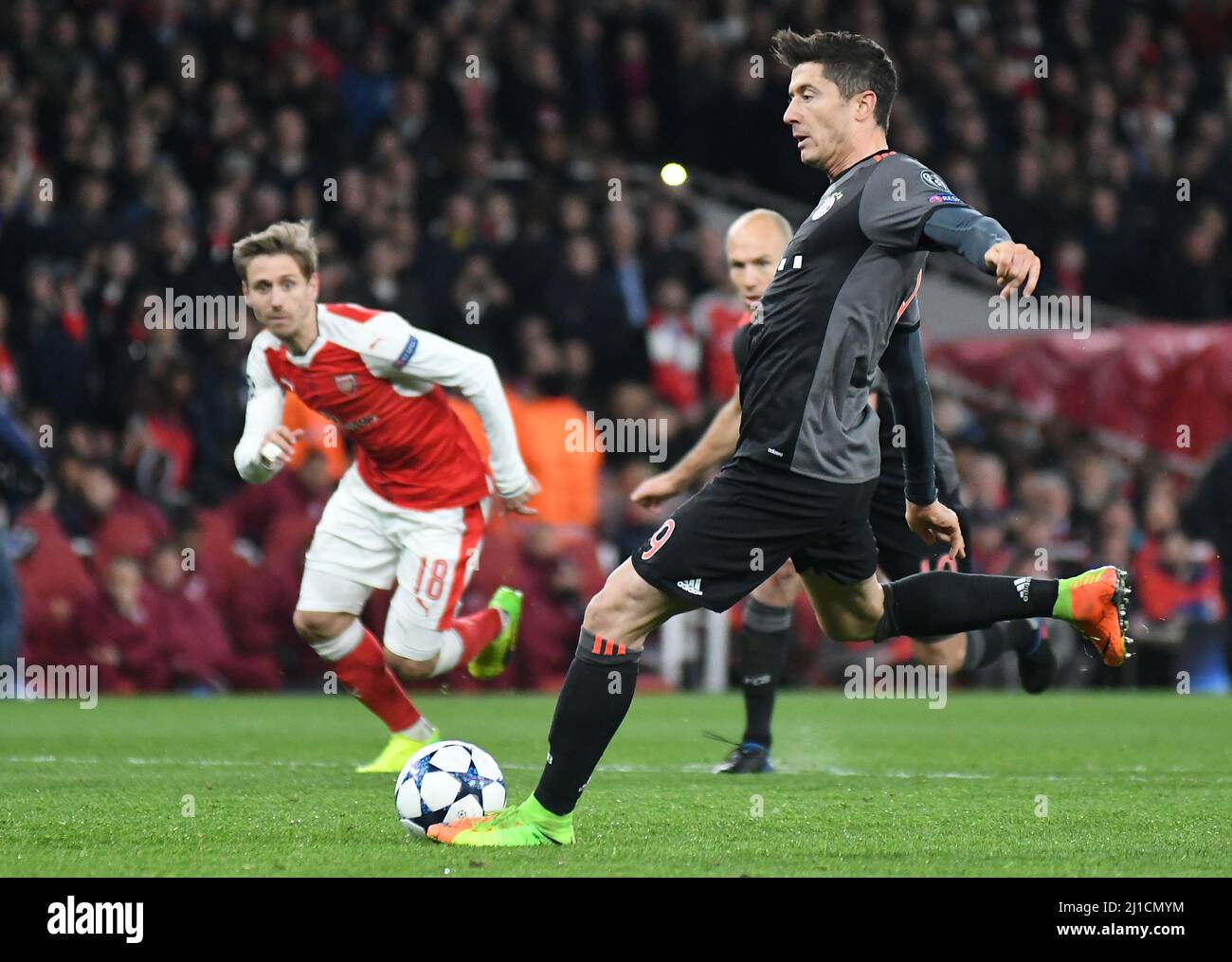 LONDON, ENGLAND - MARCH 7, 2017: Robert Lewandowski of Bayern shoots and scores from the penalty spot during the second leg of the UEFA Champions League Round of 16 game between Arsenal FC and Bayern Munchen at Emirates Stadium. Copyright: Cosmin Iftode/Picstaff Stock Photo