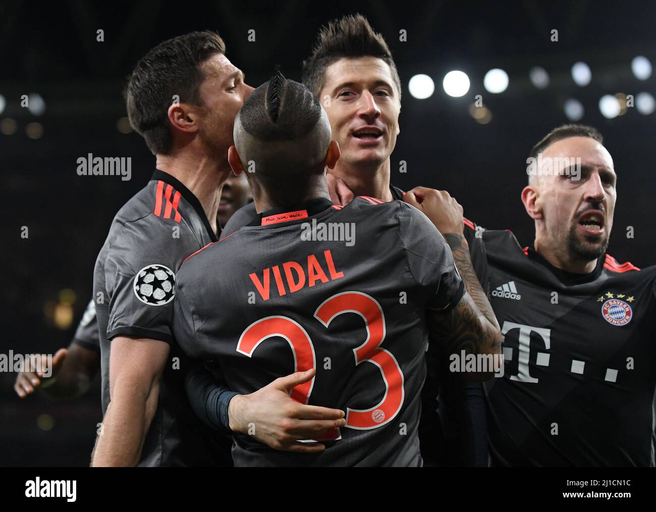LONDON, ENGLAND - MARCH 7, 2017: Arturo Vidal, Franck Ribery and Xabi Alonso celebrate with Robert Lewandowski (C) after he scored a goal during the second leg of the UEFA Champions League Round of 16 game between Arsenal FC and Bayern Munchen at Emirates Stadium. Copyright: Cosmin Iftode/Picstaff Stock Photo