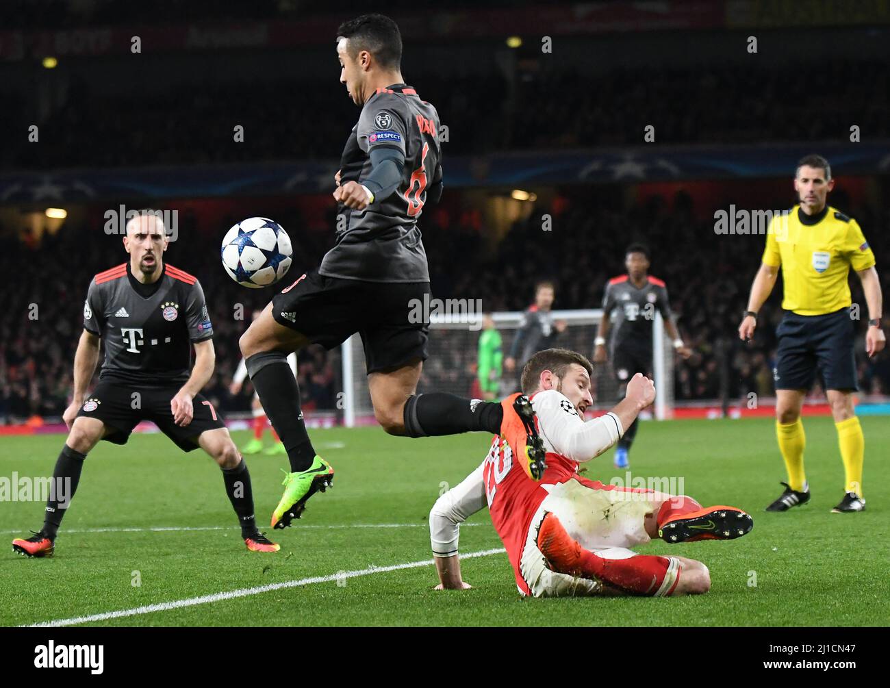 LONDON, ENGLAND - MARCH 7, 2017: Thiago Alcantara of Bayern (L) and Shkodran Mustafi (R) of Arsenal pictured in action during the second leg of the UEFA Champions League Round of 16 game between Arsenal FC and Bayern Munchen at Emirates Stadium. Copyright: Cosmin Iftode/Picstaff Stock Photo