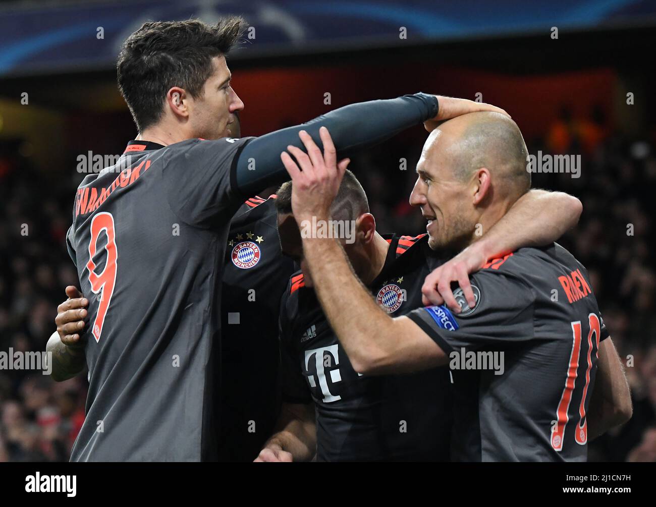 LONDON, ENGLAND - MARCH 7, 2017: Robert Lewandowski (L) congratulates Arjen Robben of Bayern after he scored a goal during the second leg of the UEFA Champions League Round of 16 game between Arsenal FC and Bayern Munchen at Emirates Stadium. Copyright: Cosmin Iftode/Picstaff Stock Photo