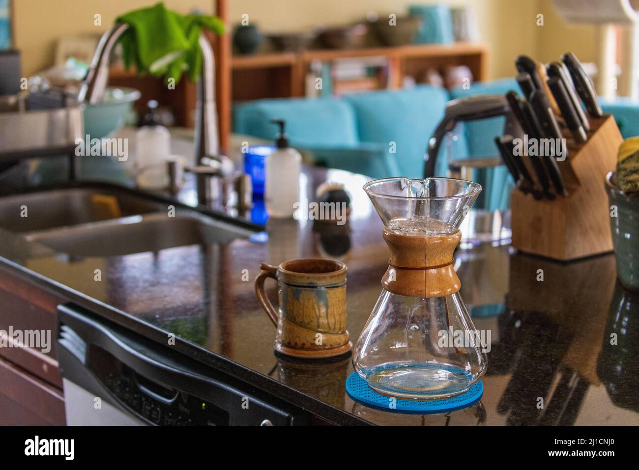 Empty coffee carafe and mug on kitchen countertop Stock Photo Alamy