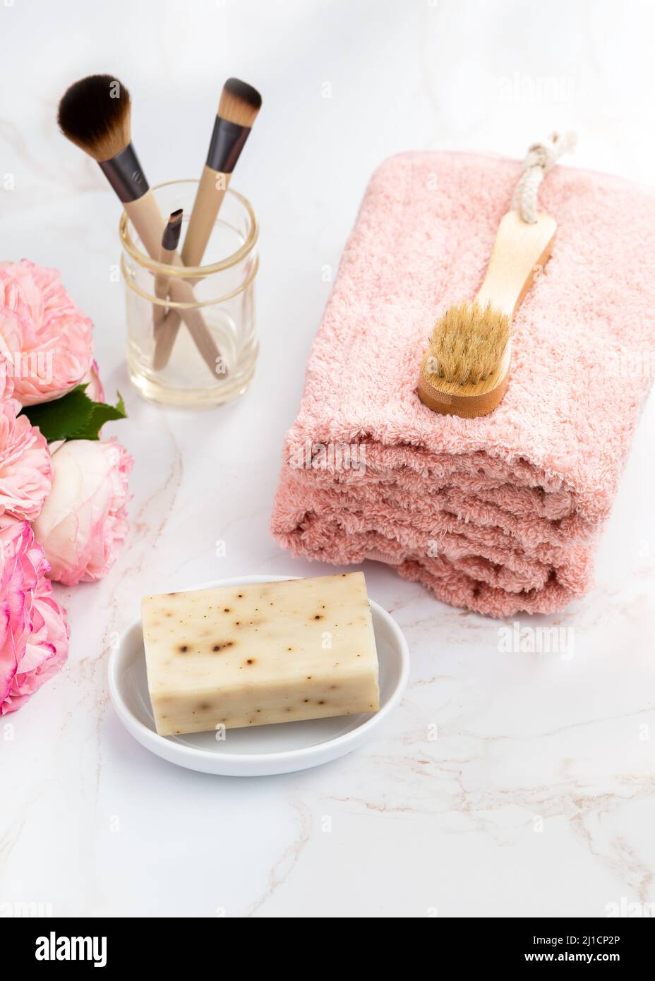 Feminine beauty products displayed on bathroom vanity Stock Photo