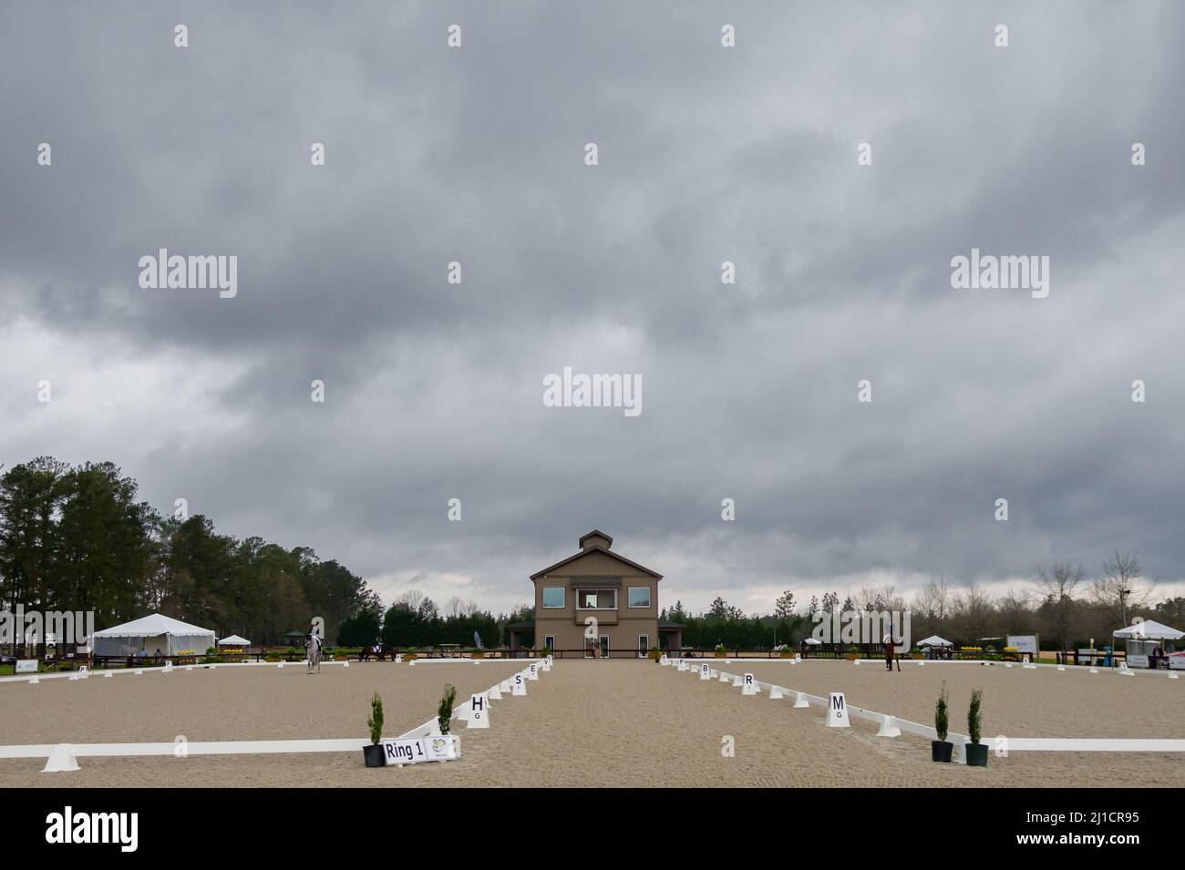 Raeford, North Carolina, USA. 24th Mar, 2022. Riders and horse competes in dressage under low