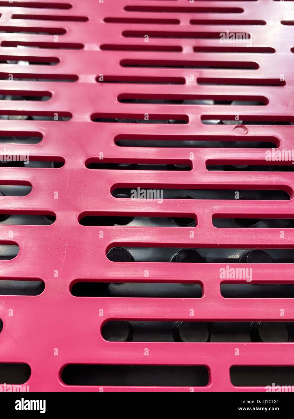Injected plastic screen in pink, used in several markets. Stock Photo